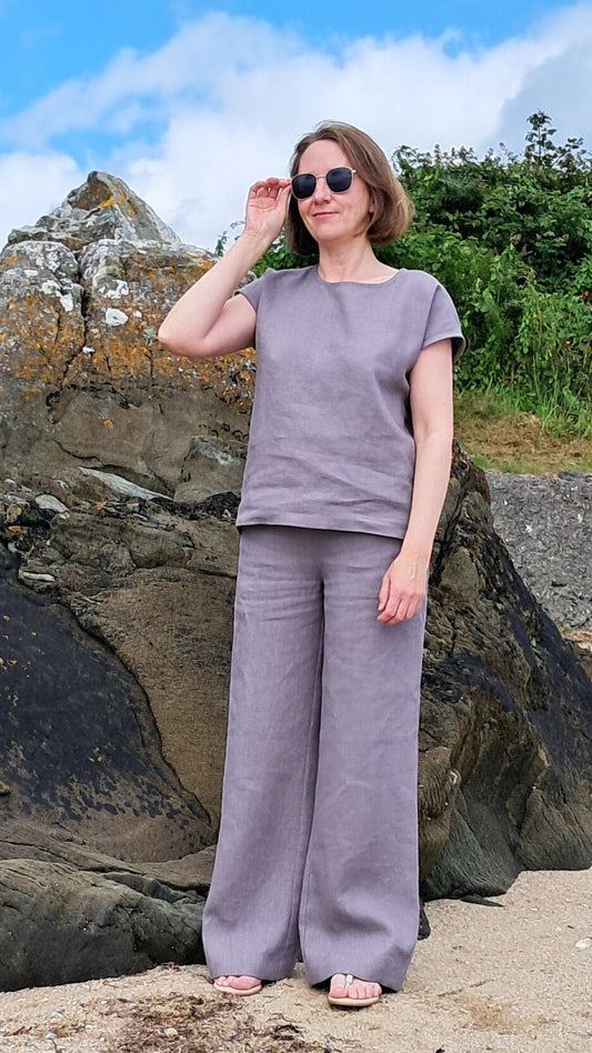 Minimalist linen blouse styled with wide-leg trousers